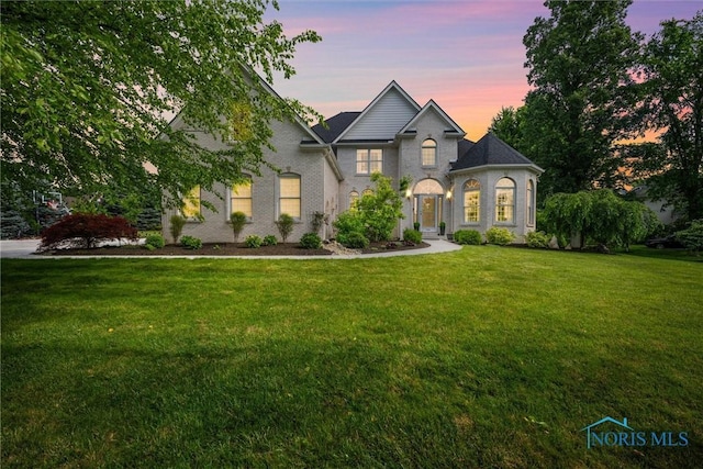 7910 Quail Creek Rd, Maumee, OH 43537 - view of front of house featuring a lawn