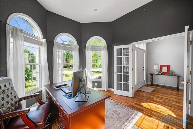 7910 Quail Creek Rd, Maumee, OH 43537 - home office featuring wood finished floors and french doors