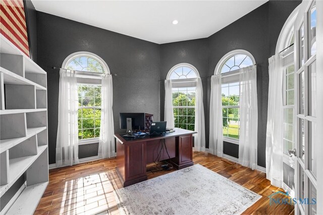 7910 Quail Creek Rd, Maumee, OH 43537 - office space with wood finished floors and an accent wall