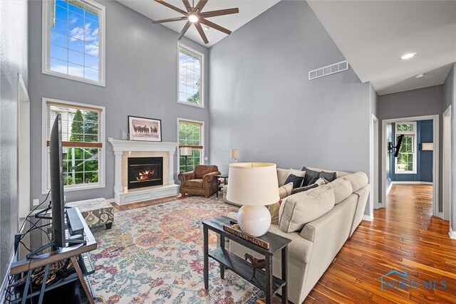 7910 Quail Creek Rd, Maumee, OH 43537 - living area with a ceiling fan, high vaulted ceiling, hardwood / wood-style flooring, healthy amount of natural light, and recessed lighting