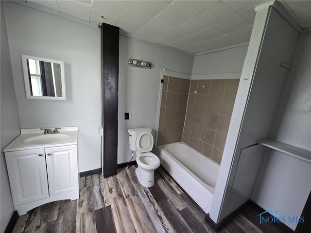 1133 Sherman St, Toledo, OH 43608 - bathroom with vanity, wood finished floors, and shower / tub combination