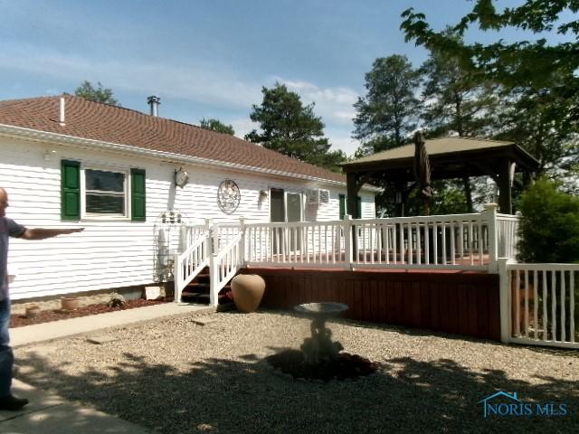 8962 State Route 109, Ottawa, OH 45875 - back of property with a deck and a gazebo