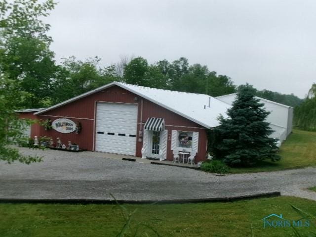 8962 State Route 109, Ottawa, OH 45875 - view of front of home with a garage