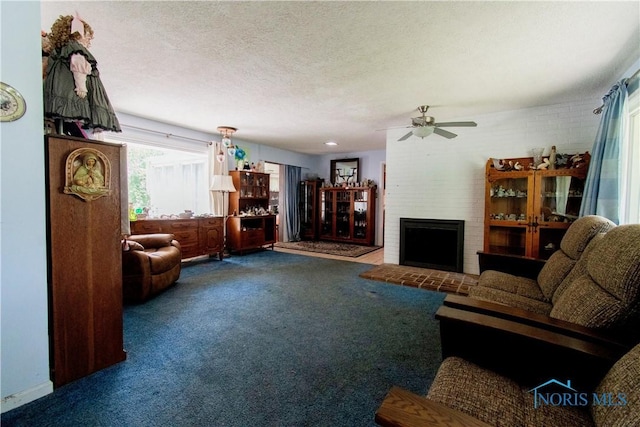 2823 Wicklow Rd, Toledo, OH 43606 - living room featuring carpet floors, a ceiling fan, a brick fireplace, and a textured ceiling