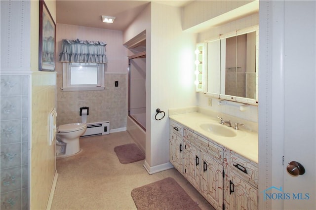 1013 Whittlesey St, Fremont, OH 43420 - bathroom with a baseboard heating unit, vanity, and bath / shower combo with glass door