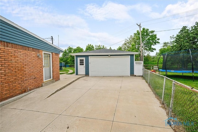 6005 Bahiamar Rd, Toledo, OH 43611 - detached garage with a trampoline