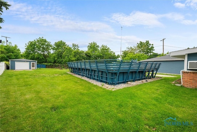 6005 Bahiamar Rd, Toledo, OH 43611 - view of yard with a garage and an outbuilding