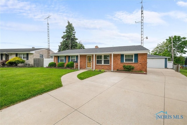 6005 Bahiamar Rd, Toledo, OH 43611 - ranch-style home featuring brick siding, a garage, and a chimney