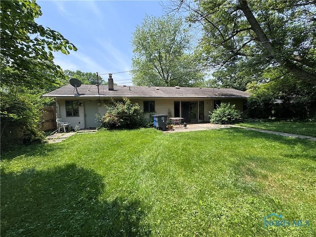 1035 Cherry St, Perrysburg, OH 43551 - rear view of house featuring a patio area and a chimney