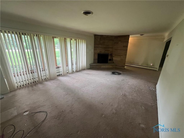 1035 Cherry St, Perrysburg, OH 43551 - unfurnished living room featuring baseboard heating and a fireplace