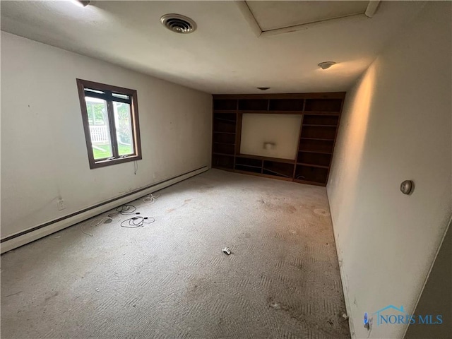 1035 Cherry St, Perrysburg, OH 43551 - unfurnished living room featuring carpet flooring and a baseboard radiator