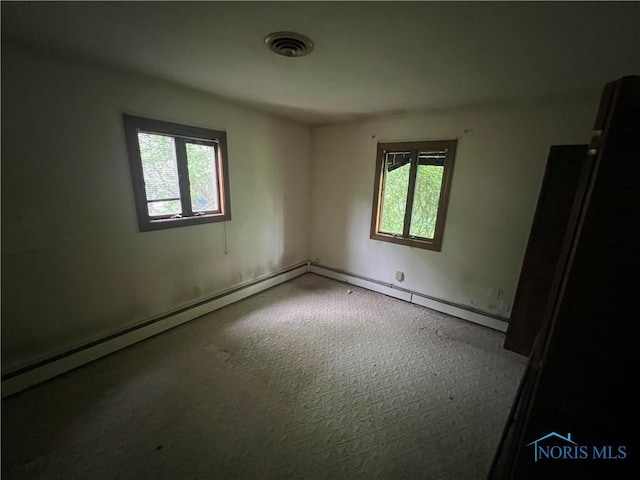 1035 Cherry St, Perrysburg, OH 43551 - spare room featuring healthy amount of natural light and carpet flooring