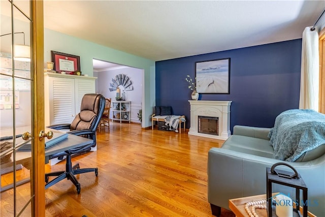 5868 Winslow Rd, Whitehouse, OH 43571 - home office with wood finished floors and a fireplace with raised hearth