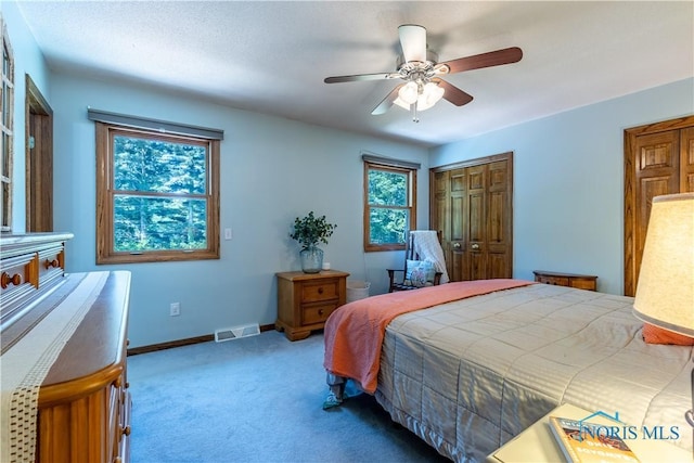 5868 Winslow Rd, Whitehouse, OH 43571 - carpeted bedroom with a ceiling fan and baseboards