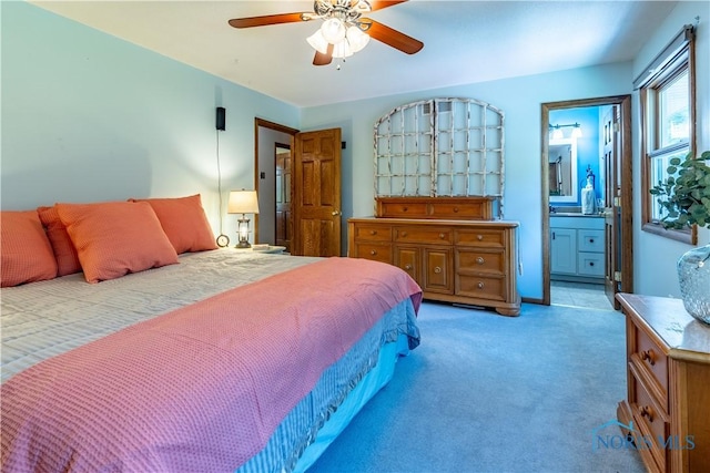 5868 Winslow Rd, Whitehouse, OH 43571 - bedroom featuring light colored carpet, connected bathroom, and a ceiling fan