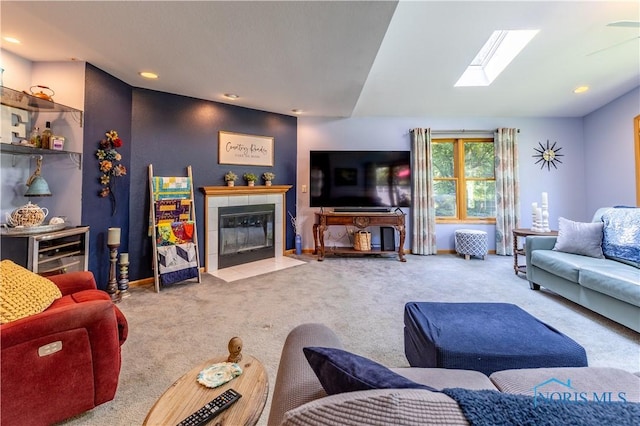 5868 Winslow Rd, Whitehouse, OH 43571 - carpeted living area featuring a skylight, recessed lighting, and a fireplace
