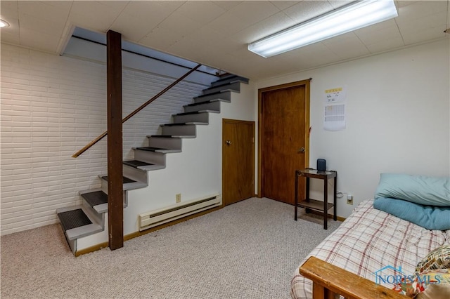 5868 Winslow Rd, Whitehouse, OH 43571 - stairway featuring a baseboard radiator, carpet floors, and brick wall