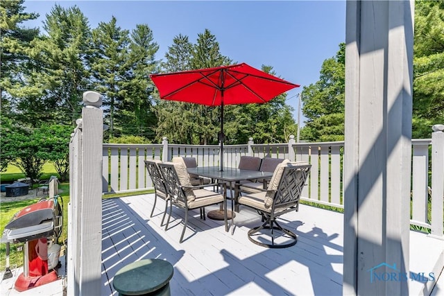 5868 Winslow Rd, Whitehouse, OH 43571 - deck with outdoor dining space and view of wooded area