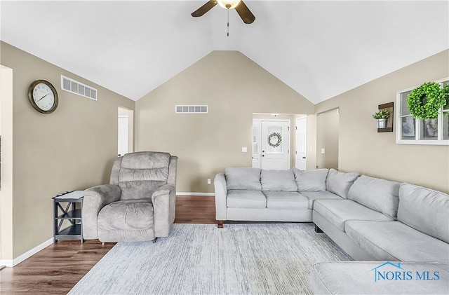 740 Tarra Oaks Dr, Findlay, OH 45840 - living area featuring a ceiling fan, wood finished floors, and high vaulted ceiling