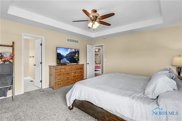740 Tarra Oaks Dr, Findlay, OH 45840 - carpeted bedroom featuring a raised ceiling and ceiling fan