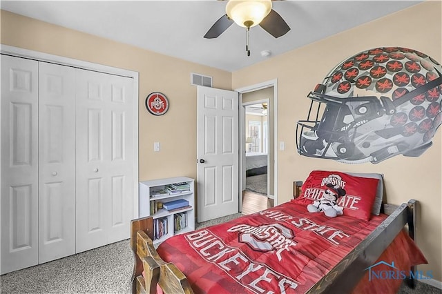 740 Tarra Oaks Dr, Findlay, OH 45840 - bedroom with a closet, a ceiling fan, and speckle patterned floor