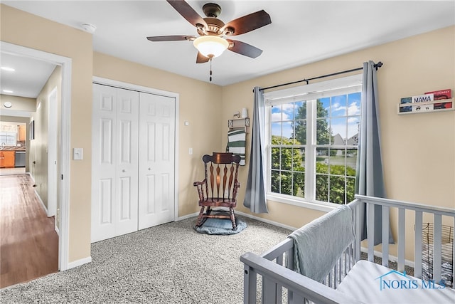 740 Tarra Oaks Dr, Findlay, OH 45840 - bedroom with a closet, ceiling fan, and a crib