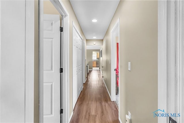 740 Tarra Oaks Dr, Findlay, OH 45840 - hall featuring wood finished floors and recessed lighting