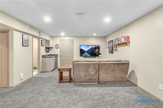 740 Tarra Oaks Dr, Findlay, OH 45840 - living room featuring carpet flooring, recessed lighting, and bar with sink