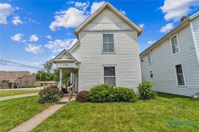 118 Allen Ave, Findlay, OH 45840 - traditional-style house featuring a front lawn