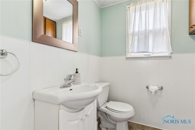 118 Allen Ave, Findlay, OH 45840 - bathroom featuring vanity and a wainscoted wall