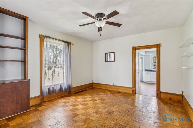 118 Allen Ave, Findlay, OH 45840 - spare room with ceiling fan and baseboards