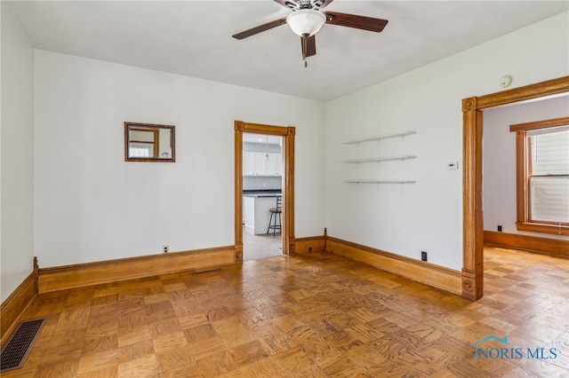 118 Allen Ave, Findlay, OH 45840 - spare room featuring ceiling fan and baseboards