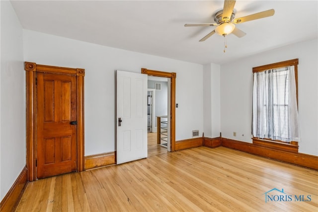 118 Allen Ave, Findlay, OH 45840 - unfurnished bedroom with light wood-style floors and a ceiling fan