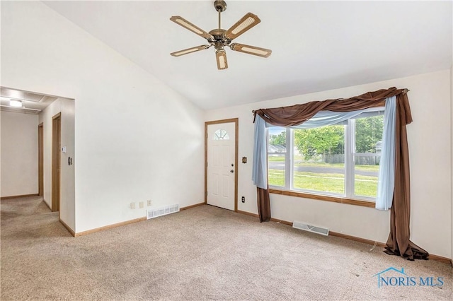 3913 Mcgregor Ln, Toledo, OH 43623 - carpeted spare room with vaulted ceiling, a ceiling fan, and attic access