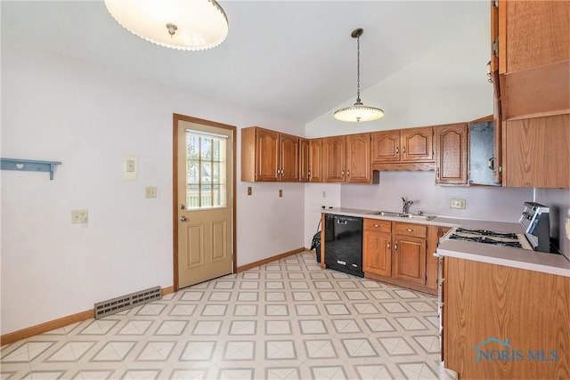 3913 Mcgregor Ln, Toledo, OH 43623 - kitchen with black dishwasher, vaulted ceiling, light floors, light countertops, and brown cabinets