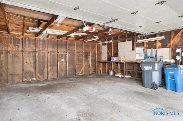 3913 Mcgregor Ln, Toledo, OH 43623 - garage featuring a garage door opener