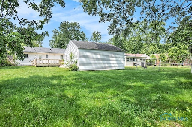 3913 Mcgregor Ln, Toledo, OH 43623 - back of house featuring a wooden deck