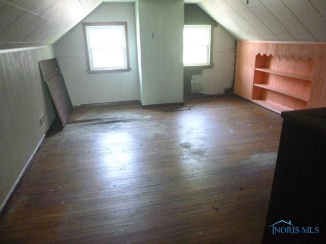 2160 Marlow Rd, Toledo, OH 43613 - bonus room with wood finished floors, vaulted ceiling, and built in shelves
