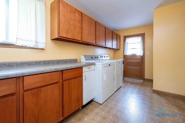 1527 Lockwood Rd, Findlay, OH 45840 - laundry area with washing machine and dryer, cabinet space, and light floors