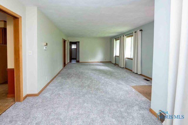 1527 Lockwood Rd, Findlay, OH 45840 - spare room featuring carpet