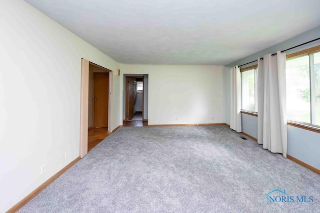 1527 Lockwood Rd, Findlay, OH 45840 - carpeted empty room with baseboards