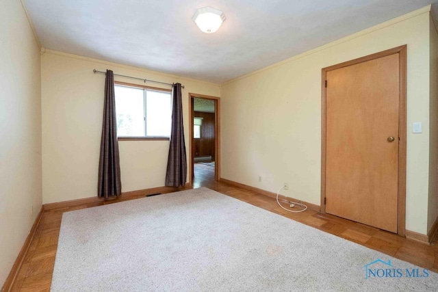 1527 Lockwood Rd, Findlay, OH 45840 - empty room featuring baseboards and crown molding