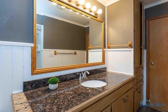 1527 Lockwood Rd, Findlay, OH 45840 - bathroom featuring ornamental molding, wainscoting, and vanity