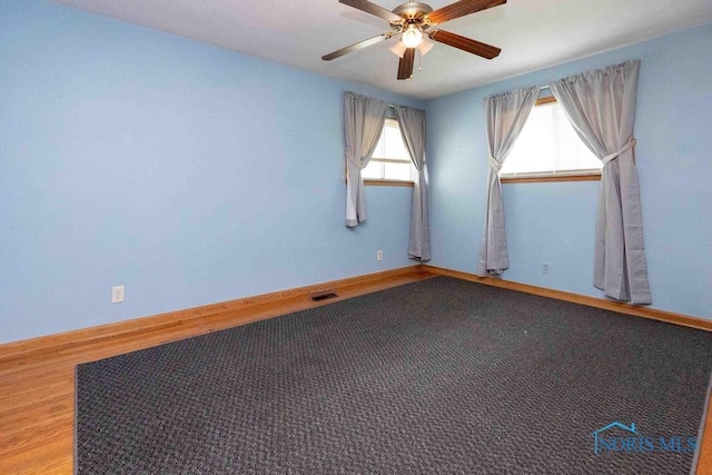 1527 Lockwood Rd, Findlay, OH 45840 - spare room with a ceiling fan and baseboards