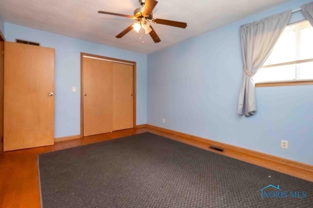 1527 Lockwood Rd, Findlay, OH 45840 - unfurnished bedroom featuring a closet and ceiling fan