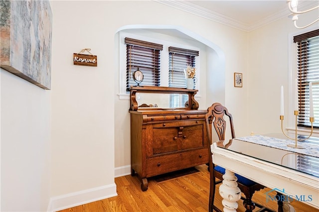 3714 Kershaw Ave, Toledo, OH 43613 - interior space with light wood finished floors, arched walkways, and crown molding