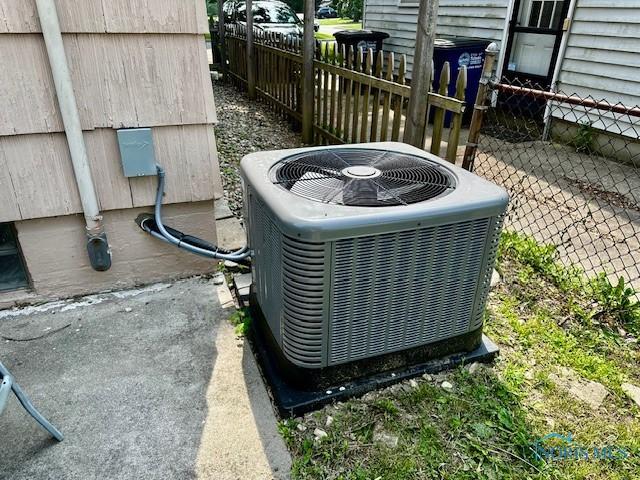 3748 Orono Dr, Toledo, OH 43614 - exterior view of a central AC unit