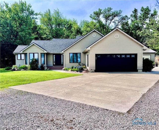 3391 Rd 144, Antwerp, OH 45813 - ranch-style home featuring driveway, a garage, a front yard, and roof with shingles