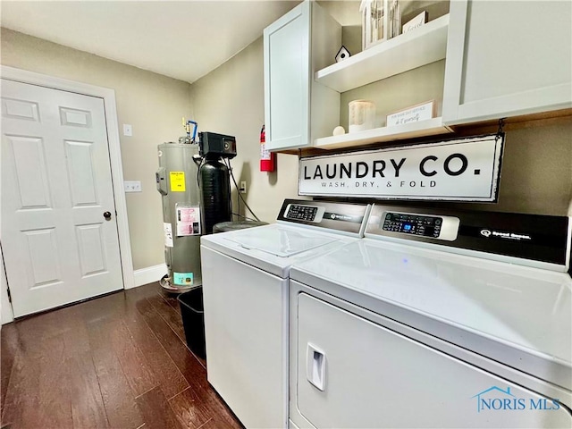 3391 Rd 144, Antwerp, OH 45813 - washroom with cabinet space, washing machine and clothes dryer, dark wood-style floors, and water heater