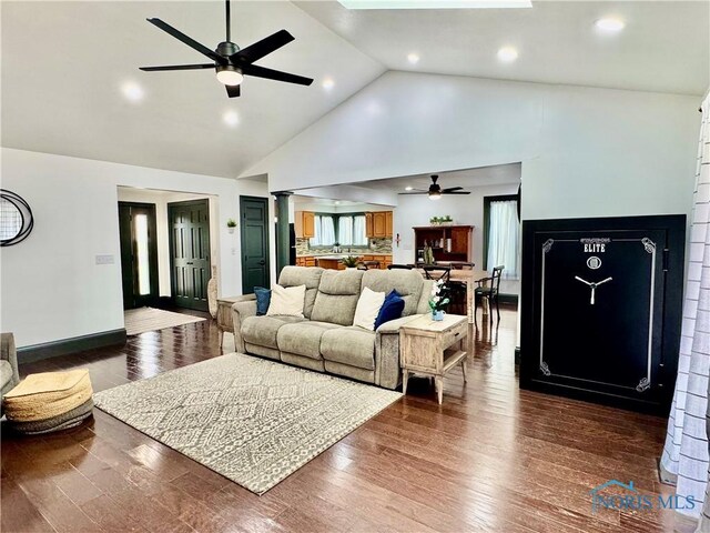 3391 Rd 144, Antwerp, OH 45813 - living room featuring a ceiling fan, high vaulted ceiling, dark wood-style floors, recessed lighting, and decorative columns